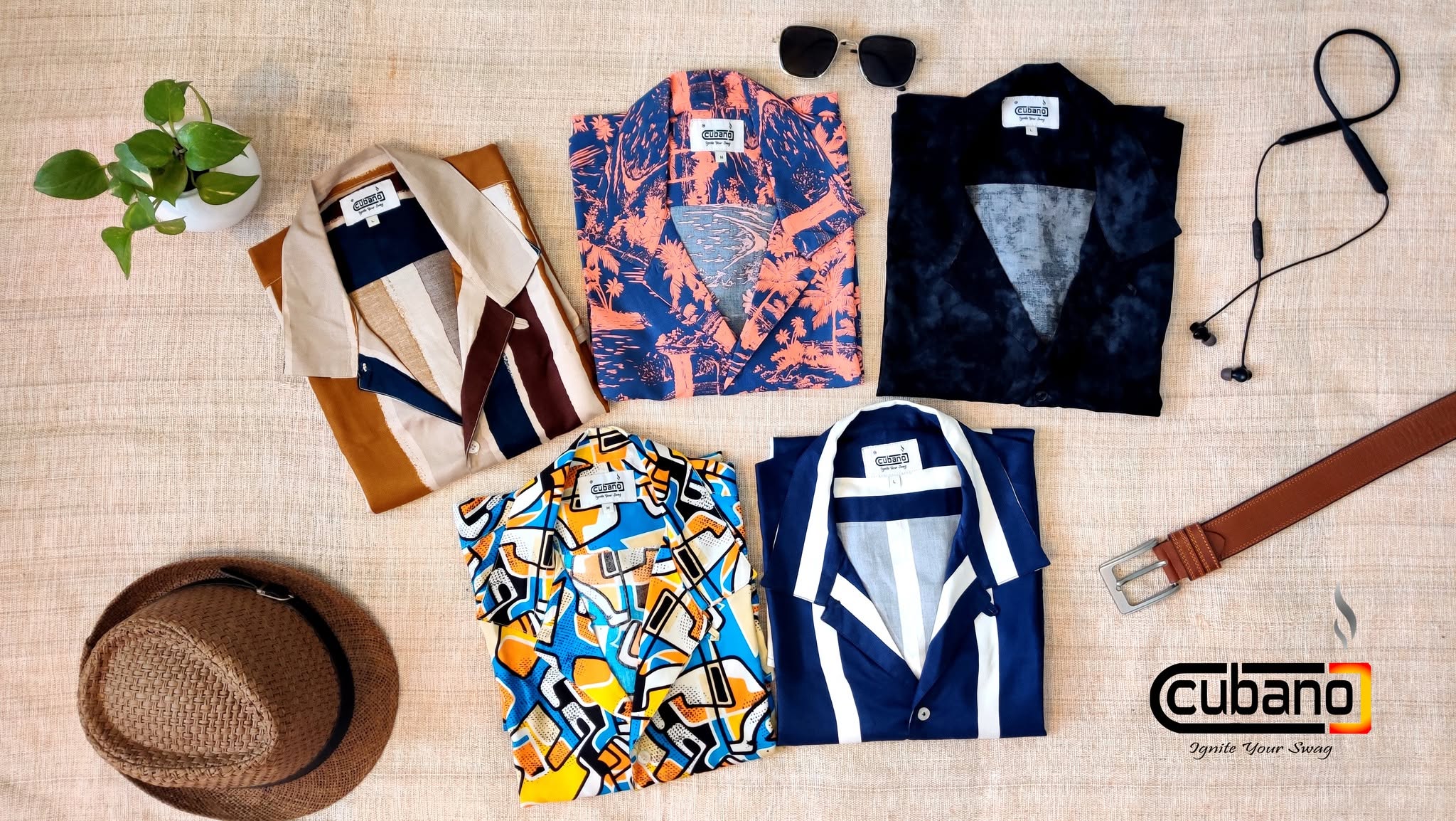 Five Cubano Clan Cuban-collar shirts arranged in a flat lay
